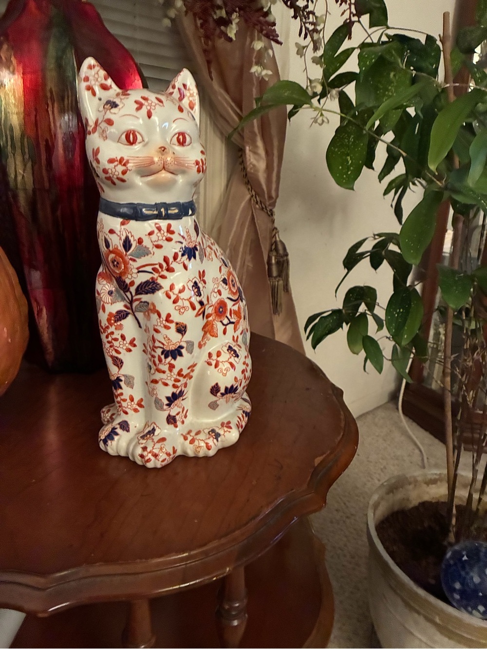 Hand-Painted Floral Ceramic Cat Figurine in White and Orange